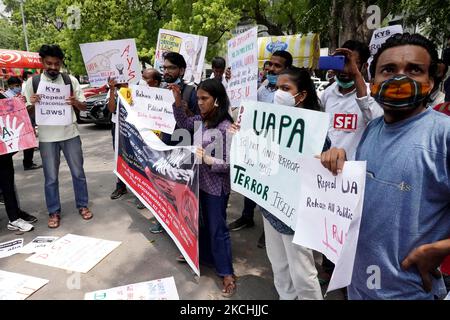 Activists hold banners and placards during a protest demanding justice for 84-year-old Indian Christian priest and activist Father Stan Swamy, in New Delhi, India on July 23, 2021. (Photo by Mayank Makhija/NurPhoto) Stock Photo