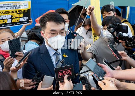 KIM NAMKUK(center), the Democratic Party's congressman holds a press conference at the Sewol memorial space on July 26, 2021 in Seoul, South Korea. Seoul Mayor Oh Se-hoon planned to demolish the memorial space for the victims of the Seowall disaster located in Gwanghwamun Square in Seoul on July 26 without agreement with the bereaved families because of the renovation of the plaza. However, due to the opposition of the bereaved family, the ruling party, and the civic groups the demolition was not carried out. The Sewol ferry disaster off South Korea's southwest coast claimed 304 lives, mostly  Stock Photo