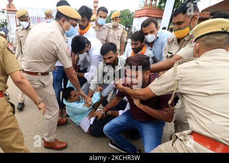 Police personnel detain Akhil Bharatiya Vidyarthi Parishad 'ABVP' activists as they protest against the state government for their demands at Rajasthan University in Jaipur, Rajasthan, India, on, July 26, 2021. (Photo by Vishal Bhatnagar/NurPhoto) Stock Photo