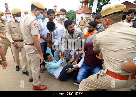 Police personnel detain Akhil Bharatiya Vidyarthi Parishad 'ABVP' activists as they protest against the state government for their demands at Rajasthan University in Jaipur, Rajasthan, India, on, July 26, 2021. (Photo by Vishal Bhatnagar/NurPhoto) Stock Photo