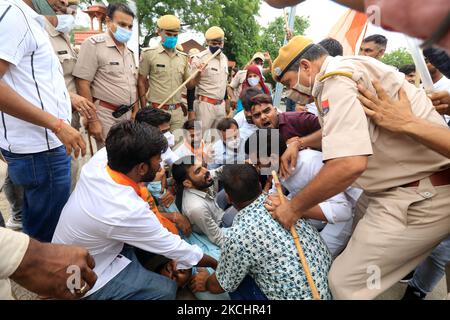 Police personnel detain Akhil Bharatiya Vidyarthi Parishad 'ABVP' activists as they protest against the state government for their demands at Rajasthan University in Jaipur, Rajasthan, India, on, July 26, 2021. (Photo by Vishal Bhatnagar/NurPhoto) Stock Photo