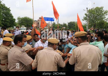 Police personnel detain Akhil Bharatiya Vidyarthi Parishad 'ABVP' activists as they protest against the state government for their demands at Rajasthan University in Jaipur, Rajasthan, India, on, July 26, 2021. (Photo by Vishal Bhatnagar/NurPhoto) Stock Photo