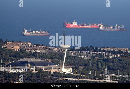 The port of Barcelona registers a historical record of commercial ship traffic, with 1.8 million containers, 31% more than in 2020, badly hit by the Coronavirus pandemic. The record is also 4.2% higher than the same period in 2019. In the photo, several ships preparing to unload containers, in Barcelona on 28th July 2021. -- (Photo by Urbanandsport/NurPhoto) Stock Photo