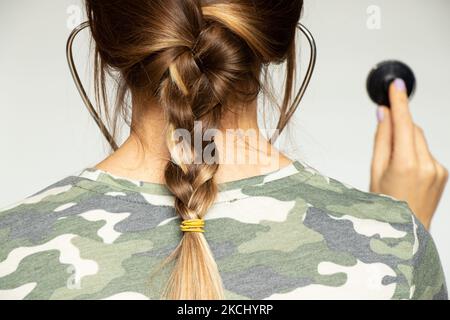 Military nurse with stethoscope over isolated background , military doctor Stock Photo