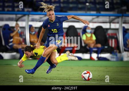 (16) Hayley RASO of Team Australia competes for the ball with (18) Fridolina ROLFO of Team Sweden during the match between Australia and Sweden on day ten of the Tokyo 2020 Olympic Games at International Stadium Yokohama on August 02, 2021 in Yokohama, Kanagawa, Japan. (Photo by Ayman Aref/NurPhoto) Stock Photo