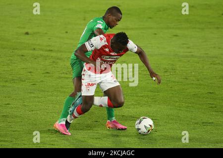 Dairon Mosquera from Santa Fe disputes the ball with Yerson Candelo from Nacional during the BetPlay League match between Independiente Santa Fe and Atletico Nacional in Bogota, Colombia, on August 4, 2021. (Photo by Daniel Garzon Herazo/NurPhoto) Stock Photo