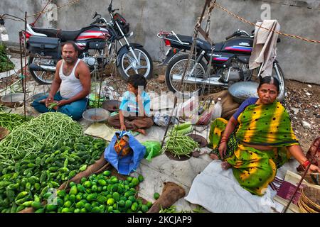 Merchants sell vegetables at the Shaniwaar Subzi Bazaar, which is the largest fruit and vegetable market in the Indian city of Nagpur, Maharashtra, India. (Photo by Creative Touch Imaging Ltd./NurPhoto) Stock Photo