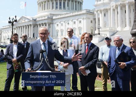 US Senate Majority Leader Chuck Schumer(D-NY)(1 left), Senators Richard Blumenthal (D-CONN)(center) and Bob Menendez(D-NJ)(1 right) alongside Family Members of 9/11 Victims speaks during a press conference about of the introduction of the September 11th Transparency Act of 2021, today on August 5, 2021 at Senate Swamp in Washington DC, USA.(Photo by Lenin Nolly/NurPhoto) Stock Photo