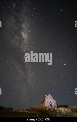 The Milky Way appears in the sky above the Church of the Good Shepherd in Lake Tekapo in the Mackenzie Country, South Island, New Zealand, on August 15, 2021. Lake Tekapo is one of the famous tourist attractions in South Island in New Zealand. (Photo by Sanka Vidanagama/NurPhoto) Stock Photo