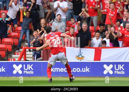 Scott McKenna of Nottingham Forest celebrates after scoring a goal to make it 1-1 during the Sky Bet Championship match between Nottingham Forest and Bournemouth at the City Ground, Nottingham on Saturday 14th August 2021. (Photo by Jon Hobley/MI News/NurPhoto) Stock Photo