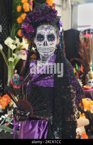 Young woman dressed as 'La Catrina the Diva of Death' during celebrations for the Day of the Dead (Dia de los Muertos) in Toronto, Ontario, Canada, on November 07, 2015. The Day of the Dead (Dia de los Muertos) is a traditional Mexican holiday which coincides with All Souls Day in the Catholic calendar, is marked by visits to the grave sites of loved ones. It is a joyous occasion during which the celebrants remember the deceased. (Photo by Creative Touch Imaging Ltd./NurPhoto) Stock Photo