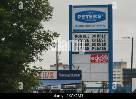 Sign that reads 'Double Double Cheese Cheese Burger Burger Please Please' seen outside Peters' Drive-In on Calgary Trail, in Edmonton. On Sunday, 21 August 2021, in Edmonton, Alberta, Canada. (Photo by Artur Widak/NurPhoto) Stock Photo