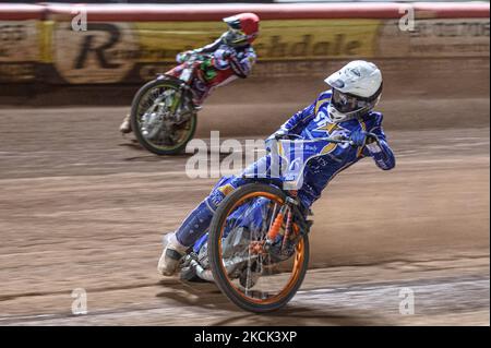 Lewis Kerr (White) inside Charles Wright (Red) during the SGB Premiership match between Belle Vue Aces and King's Lynn Stars at the National Speedway Stadium, Manchester, UK on 23rd August 2021. (Photo by Ian Charle/MI News/NurPhoto) Stock Photo