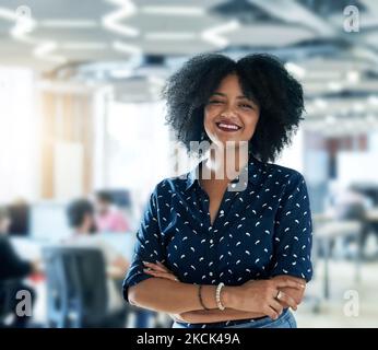 She works hard for what she wants. a young female designer working in her office. Stock Photo