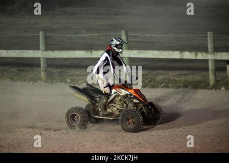 Driver races an ATV during off-road quad racing in Toronto, Ontario, Canada, on October 02, 2010. (Photo by Creative Touch Imaging Ltd./NurPhoto) Stock Photo