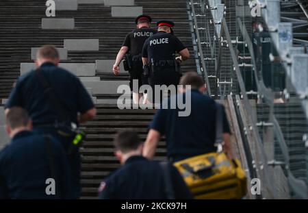 Members of the emergency services, including local Police, medics and fire brigade, seen in Edmonton downtown. Thursday, August 26, 2021, in Edmonton, Alberta, Canada. (Photo by Artur Widak/NurPhoto) Stock Photo