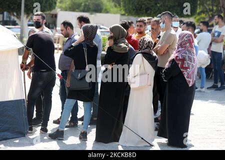 Palestinians register to receive a dose of the Sputnik-V Covid-19 vaccine during a vaccination campaign by the health ministry in Gaza City , on August 27, 2021. (Photo by Majdi Fathi/NurPhoto) Stock Photo