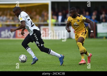Oldham Athletic's Dylan Bahamboula tussles with David Ajiboye of Sutton United during the Sky Bet League 2 match between Sutton United and Oldham Athletic at the Knights Community Stadium, Gander Green Lane,, Sutton on Saturday 28th August 2021. (Photo by Eddie Garvey/MI News/NurPhoto) Stock Photo