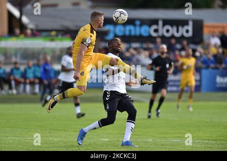 Oldham Athletic's Dylan Bahamboula tussles with Jonathan Barden of Sutton United during the Sky Bet League 2 match between Sutton United and Oldham Athletic at the Knights Community Stadium, Gander Green Lane,, Sutton on Saturday 28th August 2021. (Photo by Eddie Garvey/MI News/NurPhoto) Stock Photo