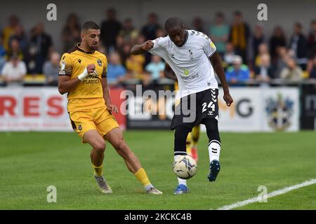 Oldham Athletic's Dylan Bahamboula tussles with Omar Bugiel of Sutton United during the Sky Bet League 2 match between Sutton United and Oldham Athletic at the Knights Community Stadium, Gander Green Lane,, Sutton on Saturday 28th August 2021. (Photo by Eddie Garvey/MI News/NurPhoto) Stock Photo