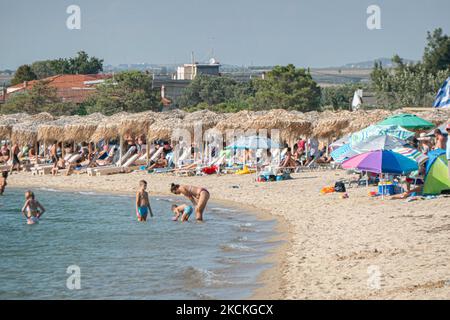 Daily life at the beach with tourists, mainly from the Balkans and ...