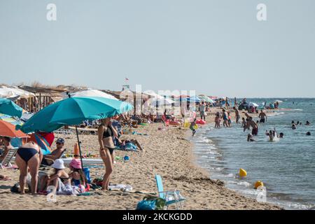 Daily life at the beach with tourists, mainly from the Balkans and ...