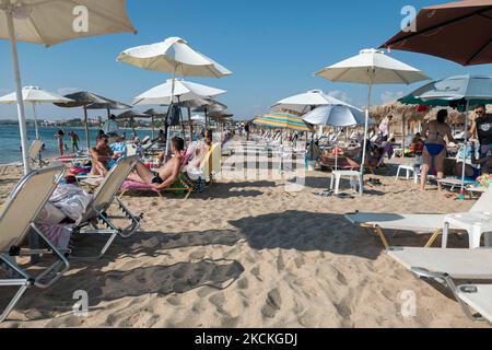 Daily life at the beach with tourists, mainly from the Balkans and ...