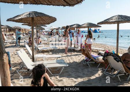 Daily life at the beach with tourists, mainly from the Balkans and ...