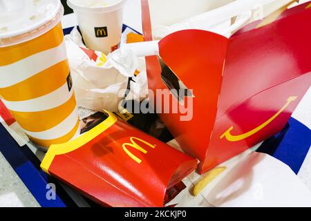 The remains of McDonald's meal are seen next to McDonald's restaurant in Krakow, Poland on August 30, 2021 (Photo by Beata Zawrzel/NurPhoto) Stock Photo
