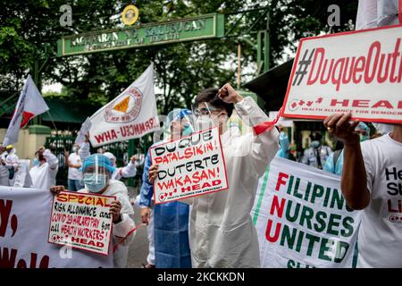Filipino health workers calling for the release of the benefits for ...
