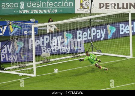Goalkeeper Wendy Martinez of Independiente Santa Fe tries to cover the penalty scored by Maria Morales of Deportivo Cali during the first leg of the final against Independiente Santa Fe for the BetPlay Women's League DIMAYOR 2021 played at the Nemesio Camacho El Campin stadium in the city from Bogota, on September 7, 2021. (Photo by Daniel Garzon Herazo/NurPhoto) Stock Photo