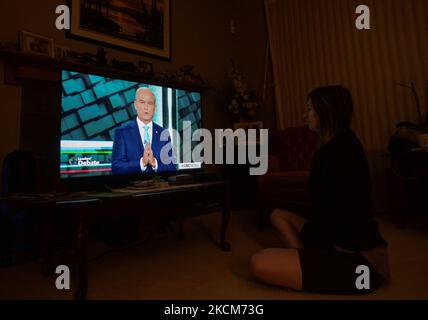 A woman watches Conservative Party of Canada Leader Erin O’Toole speaking during the official televised Federal election leaders' debate at her home in Edmonton. Five federal leaders take part in the English-language debate with Bloc Québécois Leader Yves-François Blanchet, Conservative Party of Canada Leader Erin O’Toole, Green Party of Canada Leader Annamie Paul, Liberal Party of Canada Leader Justin Trudeau and New Democratic Party Leader Jagmeet Singh. On Thursday, 9 September 2021, in Edmonton, Alberta, Canada. (Photo by Artur Widak/NurPhoto) Stock Photo