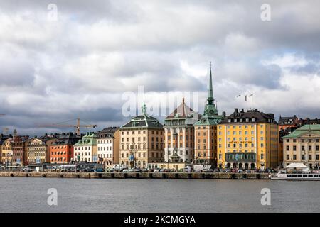 Skeppsbrokajen waterfront buildings in Gamla Stan district of Stockholm, Sweden Stock Photo