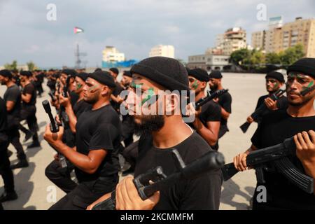 Palestinian members of Hamas' security forces attend a police graduation ceremony in Gaza City on September 16, 2021. (Photo by Majdi Fathi/NurPhoto) Stock Photo
