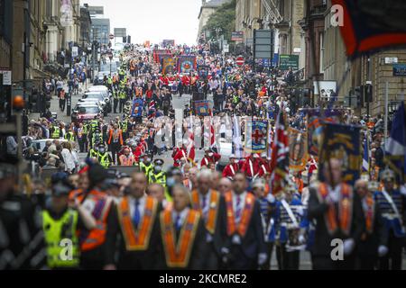 Members of the County Grand Orange Lodge take part in the annual Orange walk parade which will pass though the city centre on September 18, 2021 in Glasgow, Scotland. Over 10,000 members are expected to take part in over 30 marches across the city, last year’s marches were unable to take place due to coronavirus restrictions relating to the size of outdoor gatherings. (Photo by Ewan Bootman/NurPhoto) Stock Photo