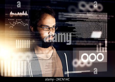 Theres always improvements to be made. a young computer programmer working on source code. Stock Photo
