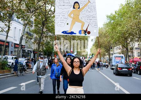 Artist Kubra Khademi leaves the protest in support of Afghan women after receiving criticism of her sign from women in the procession, in Paris, France, on September 19, 2021. (Photo by Vincent Koebel/NurPhoto) Stock Photo