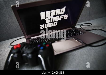 In this photo illustration, a Rockstar Games Inc logo of a video game  publisher is seen on a smartphone and a computer screen. (Photo by Pavlo  Gonchar / SOPA Images/Sipa USA Stock