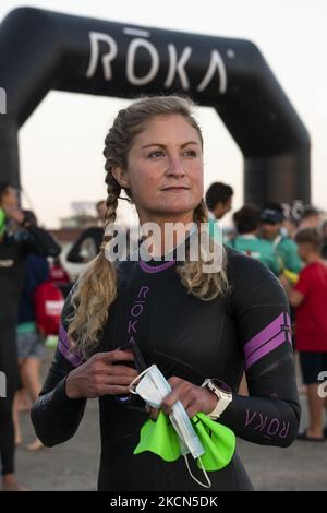 An athlete at the start, at Ironman Italy 2021, on September 18, 2021. Ironman Italy 2019 in Cervia, Emilia Romagna, Italy. More than 1600 athletes fought in the Adriatic Sea, on a 180 km bike reaching Forlimpopoli and the up hill to Bertinoro, and running inside the historical city of Cervia. (Photo by Alessandro Annunziata/NurPhoto) Stock Photo