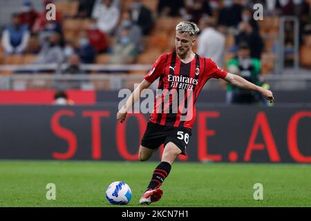 Alexis Saelemaekers (AC Milan) shoots the ball during the Italian football Serie A match AC Milan vs Venezia FC on September 22, 2021 at the San Siro stadium in Milan, Italy (Photo by Francesco Scaccianoce/LiveMedia/NurPhoto) Stock Photo