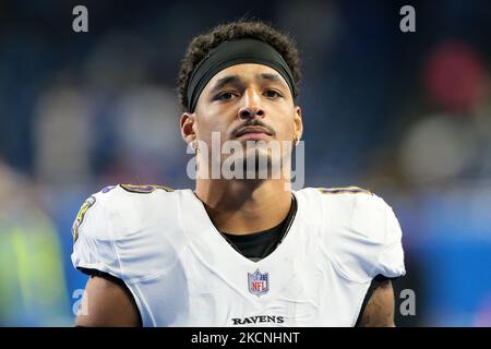 Baltimore Ravens wide receiver Tylan Wallace (16) makes a reception at the  sideline, but field judge James Coleman (95) watches Wallace's right foot  lift as the pass was caught, for an incomplete