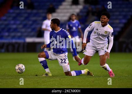 Oldham Athletic's Raphaël Diarra tussles with Amari Miller of Leeds United during the EFL Trophy match between Oldham Athletic and Leeds United at Boundary Park, Oldham on Tuesday 28th September 2021. (Photo by Eddie Garvey/MI News/NurPhoto) Stock Photo