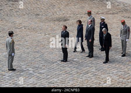 French President Emmanuel Macron greets military personnel, Prime Minister Jean Castex and Defence Minister Florance Parly during the national tribute to Maxime Blasco, a soldier killed in Mali on 24 September, at the Hotel des Invalides, in Paris, in September 29, 2021. (Photo by Andrea Savorani Neri/NurPhoto) Stock Photo