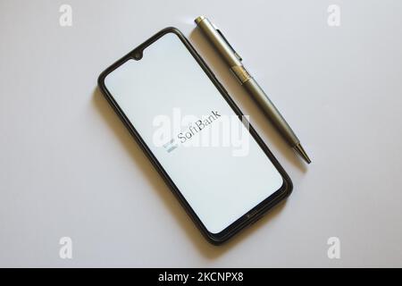 In this photo illustration a SoftBank logo is display on a smartphone screen and a pencil in Athens, Greece on September 30, 2021. (Photo by Nikolas Kokovlis/NurPhoto) Stock Photo