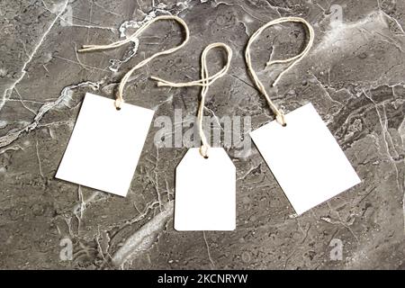 Rectangle tag mockup, square tag mockup with white card, close up. Various price Stock Photo