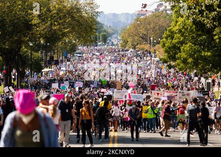 More than 15,000 protesters en route to the US Supreme Court from downtown during the Women's March Rally for Abortion Justice in Washington, DC. Protesters demand the US government protect women's reproductive rights and access to abortion nationwide. Specifically, they are calling on Congress to pass the Women's Health Protection Act (WHPA) and EACH Act, which guarantee abortion access and require it to be covered by insurance. More than 600 satellite protests are happening nationwide on October 2. The events are partly in response to restrictive anti-abortion laws recently passed in Texas a Stock Photo