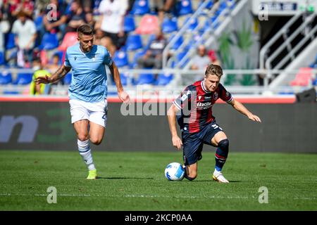 Foul of Sergej Milinkovic-Savic (Lazio) on Mattias Svanberg (Bologna) during the Italian football Serie A match Bologna FC vs SS Lazio on October 03, 2021 at the Renato Dall&#39;Ara stadium in Bologna, Italy (Photo by Ettore Griffoni/LiveMedia/NurPhoto) Stock Photo