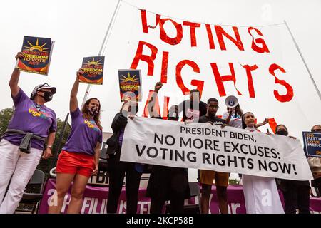Activists rally at the White House, demanding that the Biden Administration take the lead on voting rights and pressure Congress to pass legislation protecting the right to vote. (Photo by Allison Bailey/NurPhoto) Stock Photo