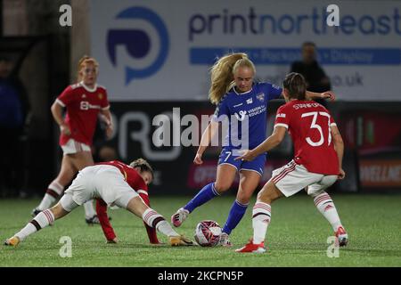 Manchester United's Hayley Ladd and Lucy Staniforth in action with Durham Women's Beth Hepple during the FA Women's Continental League Cup match between Durham Women and Manchester United at Maiden Castle, Durham City on Thursday 14th October 2021. (Photo by Mark Fletcher/MI News/NurPhoto) Stock Photo