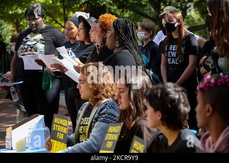 People attend a climate change rally and a youth-led hunger strike near the White House on October 22, 2021. The five youth were on day three of a hunger strike to bring attention to the climate crisis and call on the government for change. (Photo by Bryan Olin Dozier/NurPhoto) Stock Photo